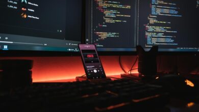 black remote control on red table